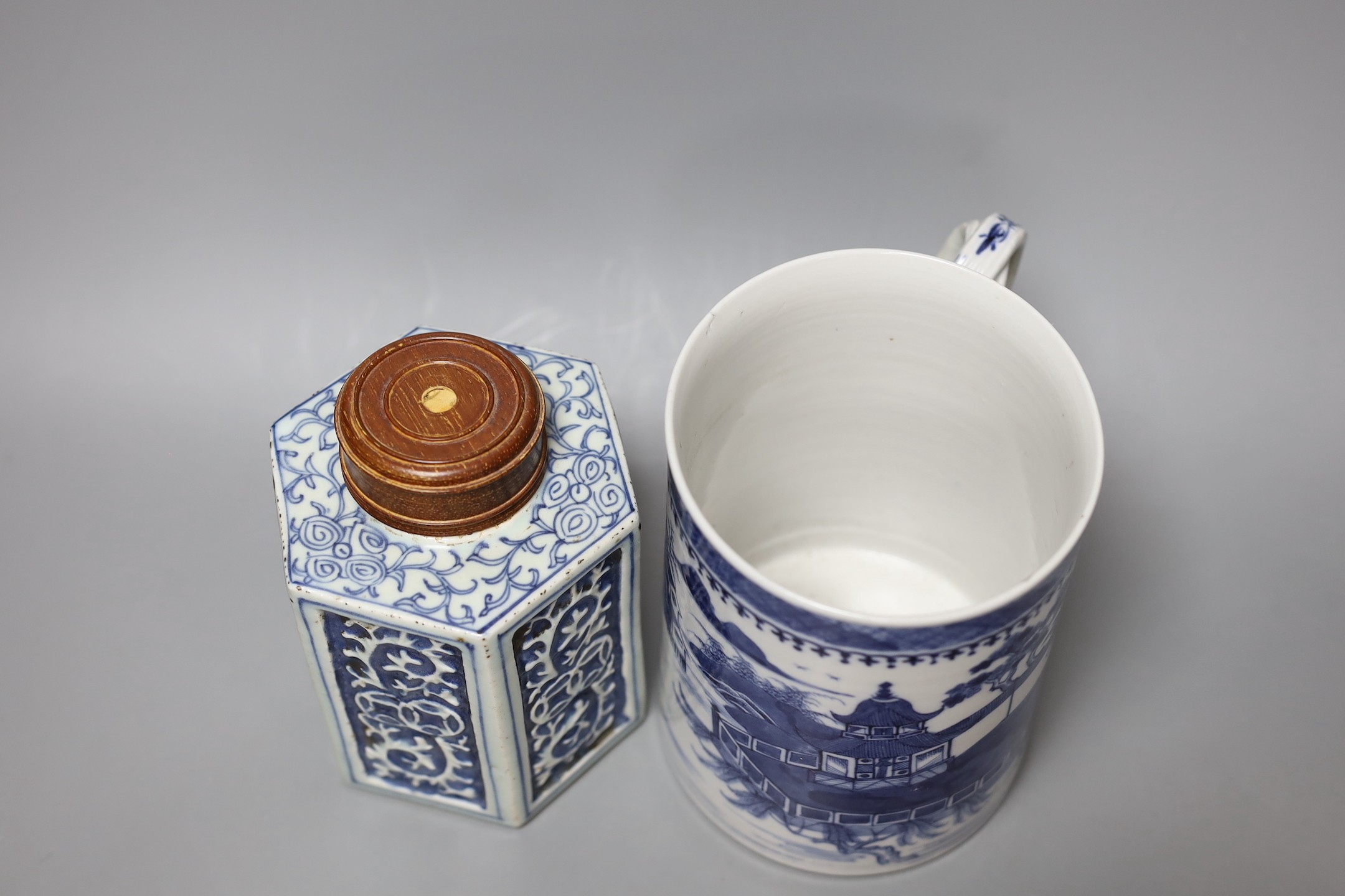 A Chinese blue and white tankard and a jar and cover, tankard 15.5 cms high